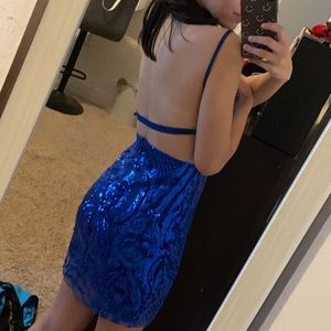 A royal blue strapless homecoming dress. It is backless and it fits perfect!